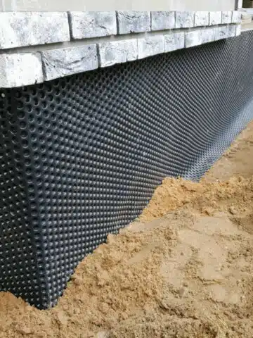 Foundation drainage preparation in construction site