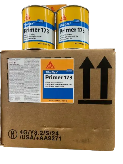 Two 1-pint cans of Sika Primer 173 along with the box of 12 they come in